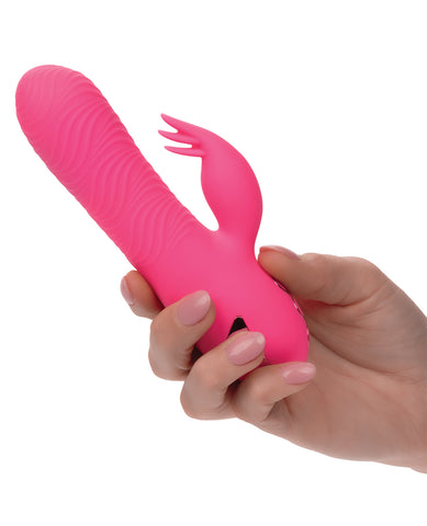 California Dreaming Sacramento Sweetie rotating vibrator with external stimulator held in hand