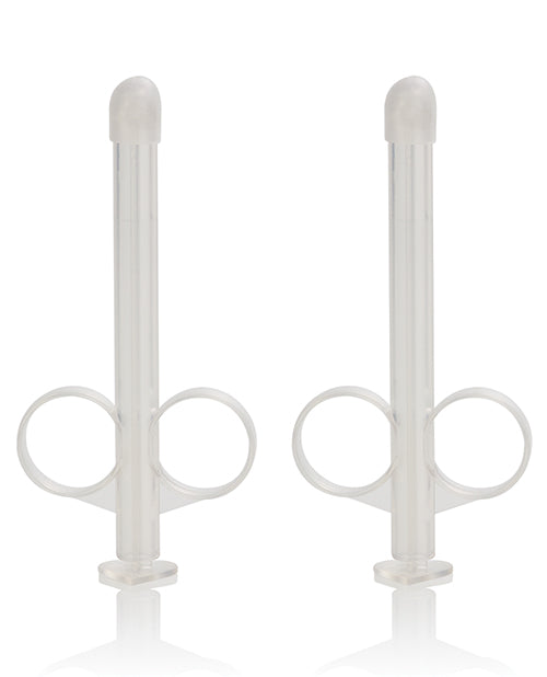 Two clear lube tubes facing up.