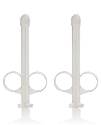 Two clear lube tubes facing up.