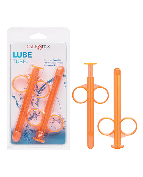 Two orange lube tubes next to two others in blue packaging.