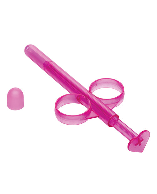 A pink lube tube angled away from the camera.