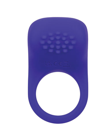 A purple silicone adult novelty product with a textured circular top and a large central ring cutout, shown on a plain white background.