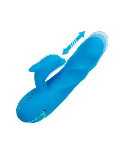 A blue dolphin-shaped adult novelty toy with a suction cup base, shown on a plain white background with a blue double-arrow graphic.