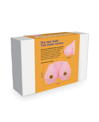 The back of the box to a LEGO-style bust made of blocks to form two breasts.