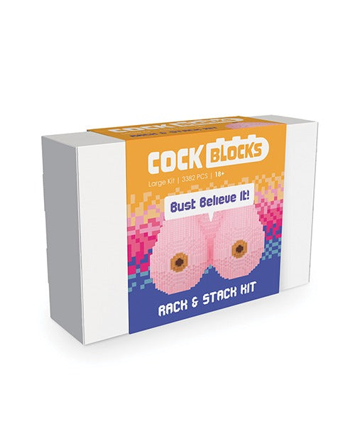 The box for a LEGO-style bust made of blocks to form two breasts. The box says "Bust Believe It"