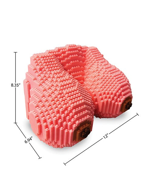 A LEGO-style bust made of blocks to form two breasts with measurements. The bust is 12" x 6.94" x 8.35".