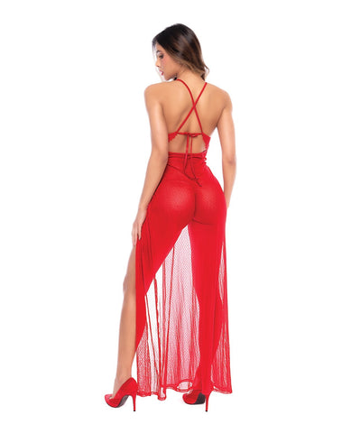 A woman shown from the back wearing a bright red open-back maxi dress with a high slit and sheer mesh overlay, paired with red high heels, on a plain white background.