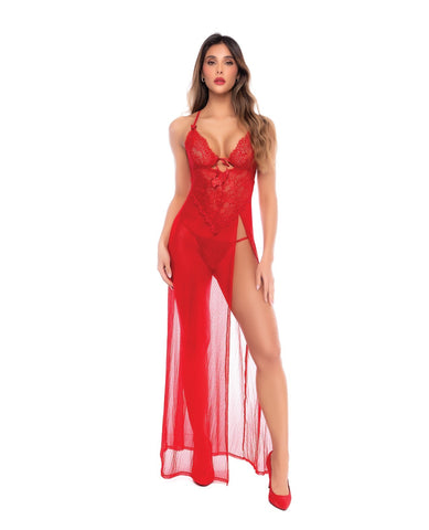 A woman modeling a red lace and sheer maxi lingerie dress with a thigh-high slit and keyhole front detail, shown against a plain white background.