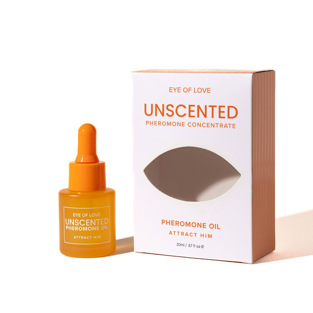 A bottle of Eye of Love Unscented Pheromone Oil next to its white and peach packaging box, set against a clean white background.