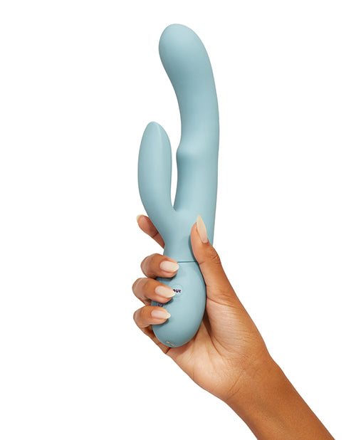 Blue Advanced rabbit toy with internal motion feature hand held for size comparison