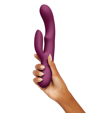 Rabbit vibrator with side-to-side swaying motion hand held for sizing comparison