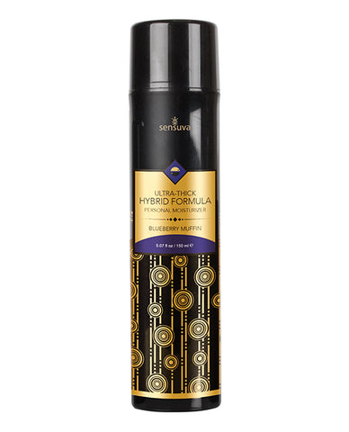 Personal lubricant bottle with black and gold design on a white background