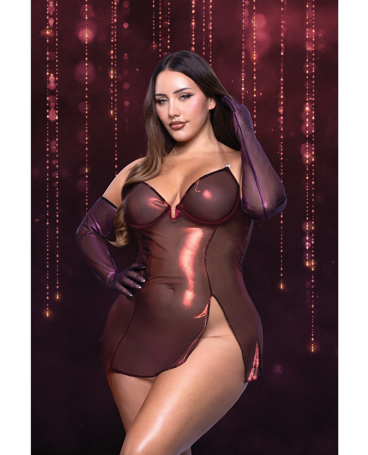 Model wearing a shimmering lingerie dress.