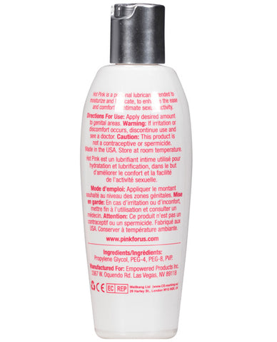 Bottle of lubricant with white label and silver cap on a white background