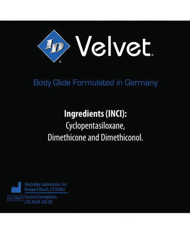ID Glide product label with ingredients listed on a black background