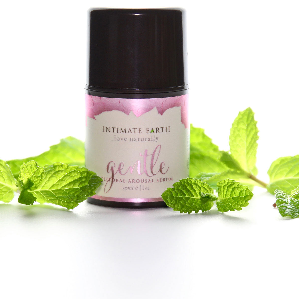 Intimate Earth gentle product with mint leaves on a white background