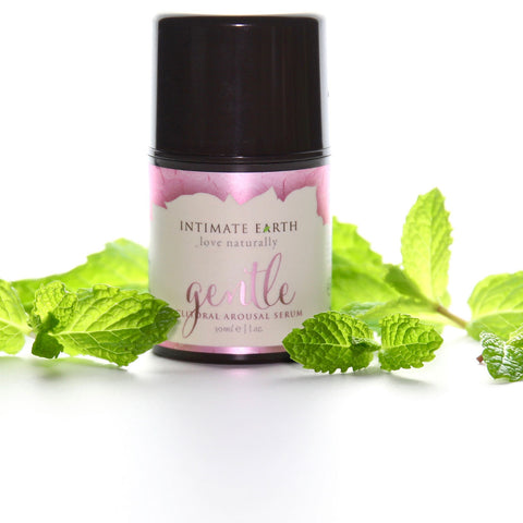 Intimate Earth gentle product with mint leaves on a white background
