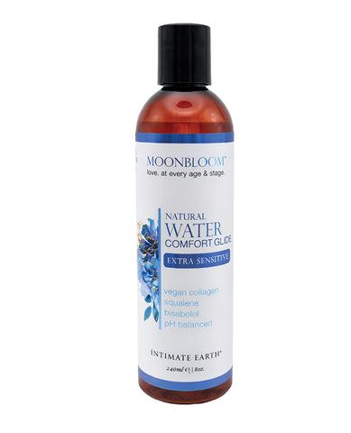 Bottle of Moonbloom Natural Water Comfort Glide on a white background