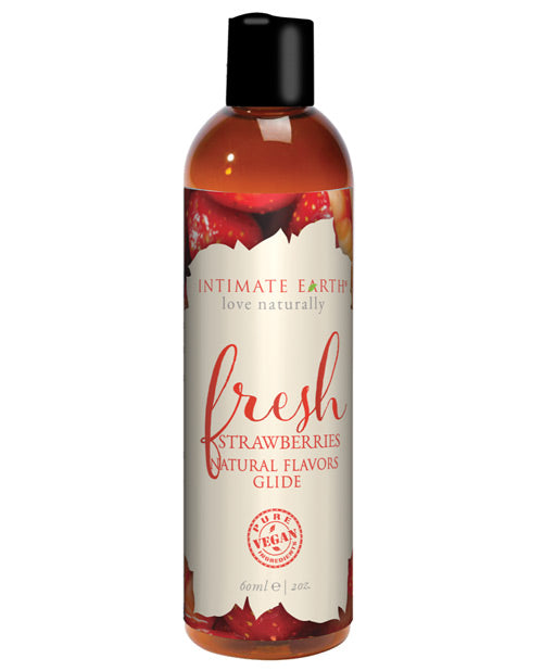 A bottle of Intimate Earth Fresh Strawberries Natural Flavor Glide - 2oz
