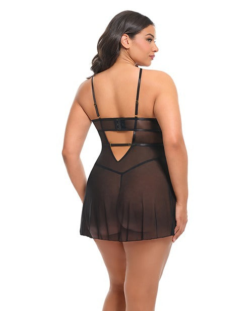 Back view of a woman wearing sheer black lingerie.