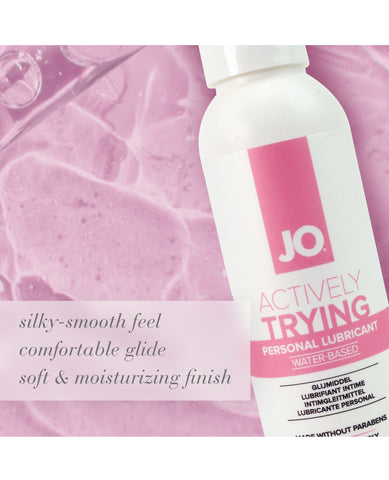 JO personal lubricant bottle on a pink textured background