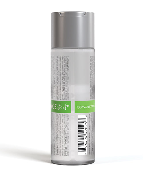 Lubricant bottle with silver cap and label on a white background