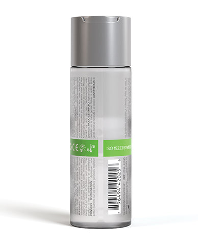 Lubricant bottle with silver cap and label on a white background