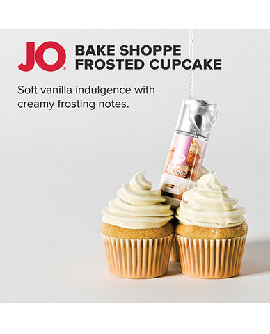 JO Bake Shoppe Frosted Cupcake with a bottle of JO on a white background