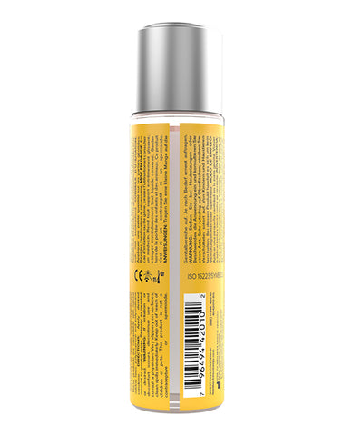 Yellow bottle with silver cap on a white background
