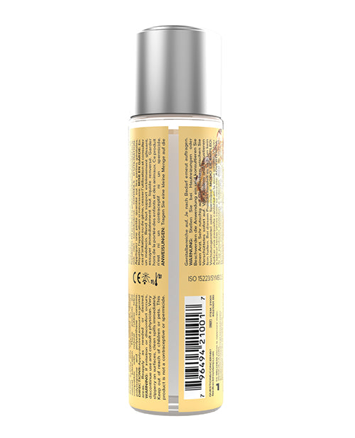 Bottle with a yellow label and silver cap on a white background
