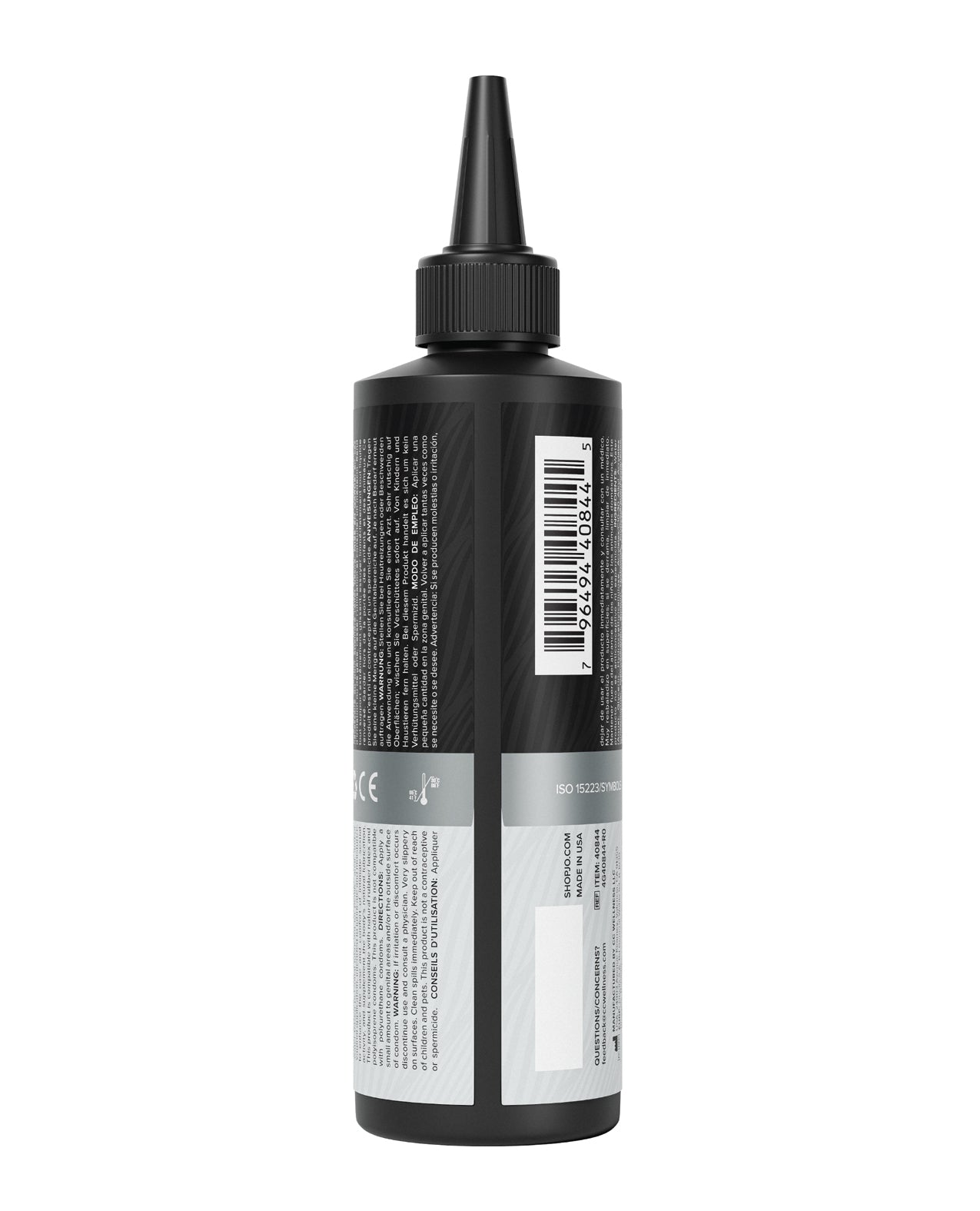 Black bottle with a label on a white background