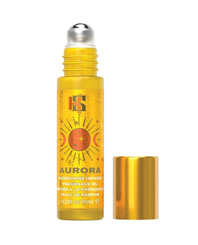 A bottle of Kama Sutra pheromone infused fragrance oil from the Celestial Collection in the fragrance "AURORA". The top is unscrewed and there is a silver roller ball at the top of the applicator.