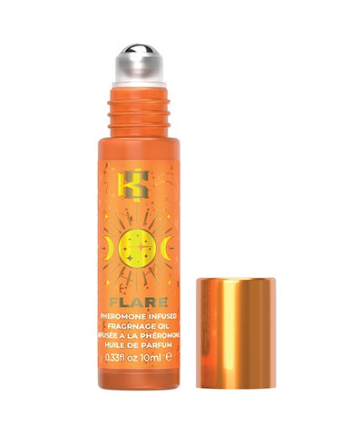 A bottle of Kama Sutra pheromone infused fragrance oil from the Celestial Collection in the fragrance "FLARE". The top is unscrewed and there is a silver roller ball at the top of the applicator.