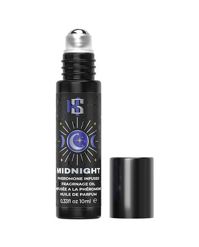 A bottle of Kama Sutra pheromone infused fragrance oil from the Celestial Collection in the fragrance "MIDNIGHT". The top is unscrewed and there is a silver roller ball at the top of the applicator.
