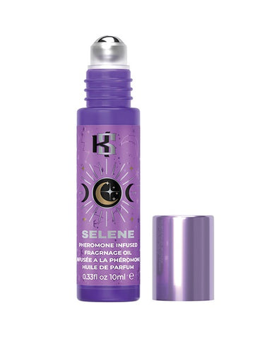 A bottle of Kama Sutra pheromone infused fragrance oil from the Celestial Collection in the fragrance "SELENE". The top is unscrewed and there is a silver roller ball at the top of the applicator.