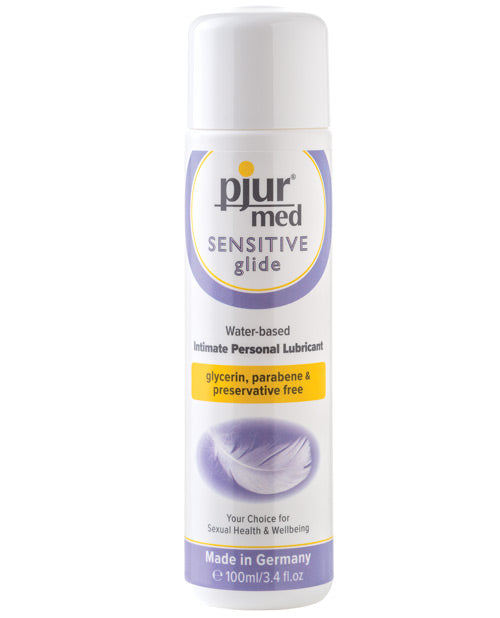 A bottle of Pjur Med Sensitive Glide Water Based Personal Lubricant. The bottle is white with purple accents and features an image of a feather.