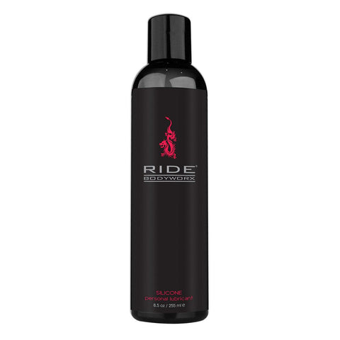 Black bottle of Ride Bodyworx silicone personal lubricant on a white background
