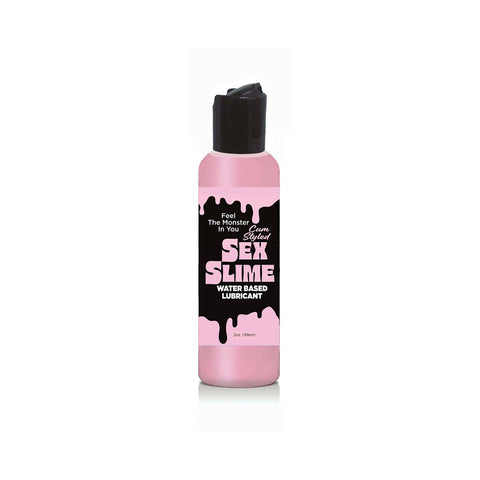 Pink bottle of Sex Slime lubricant on a white background