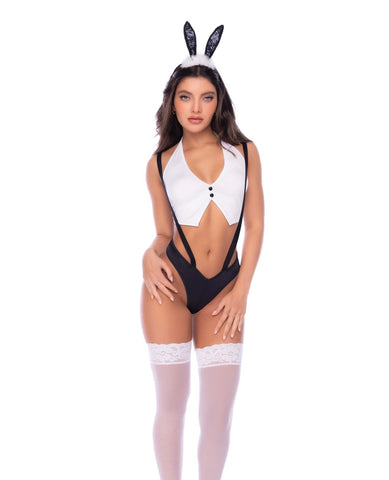 A woman modeling a bunny costume set featuring a white and black cutout bodysuit, white thigh-high stockings with lace tops, and a black-and-white bunny headband, against a plain white background.