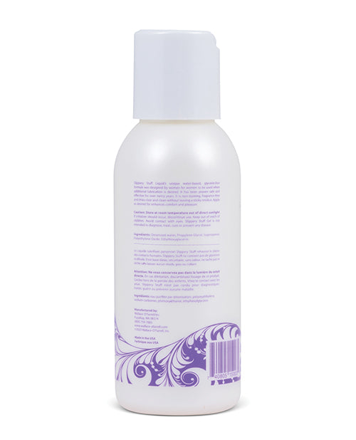The back of a small bottle of Slippery Stuff Liquid. The bottle is pearlescent and has a purple swirly design at the bottom.