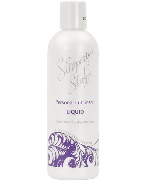 A bottle of Slippery Stuff Liquid. The bottle is pearlescent and has a purple swirly design at the bottom.