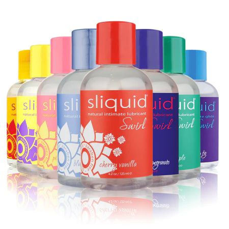 Assorted bottles of sliquid lubricant with colorful caps on a white background