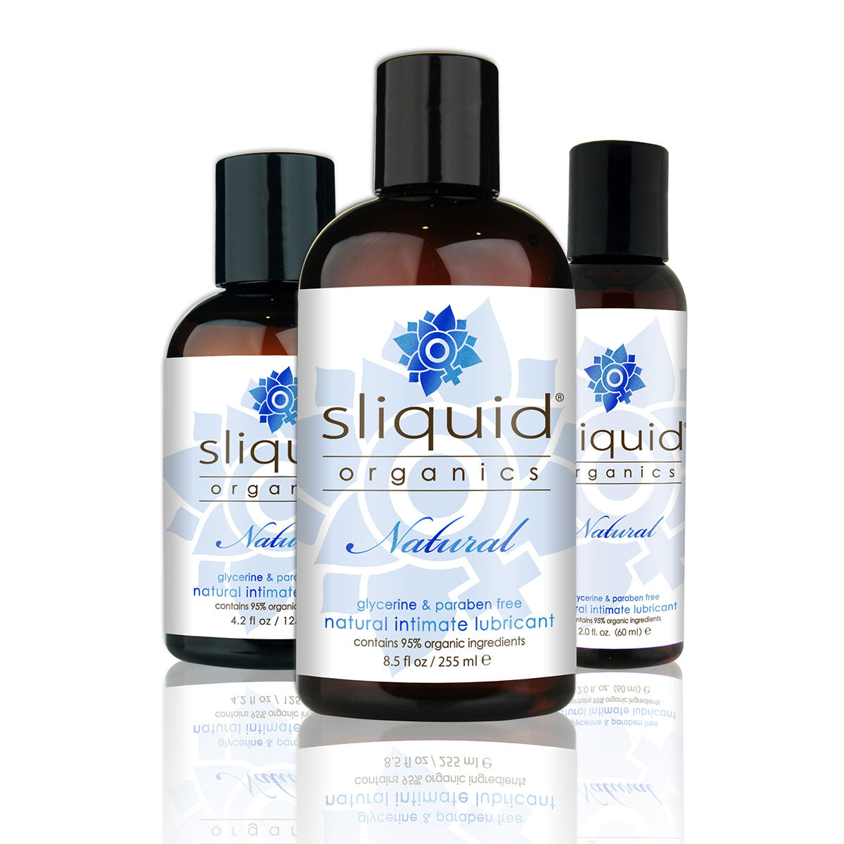 Three bottles of sliquid organics natural intimate lubricant on a white background