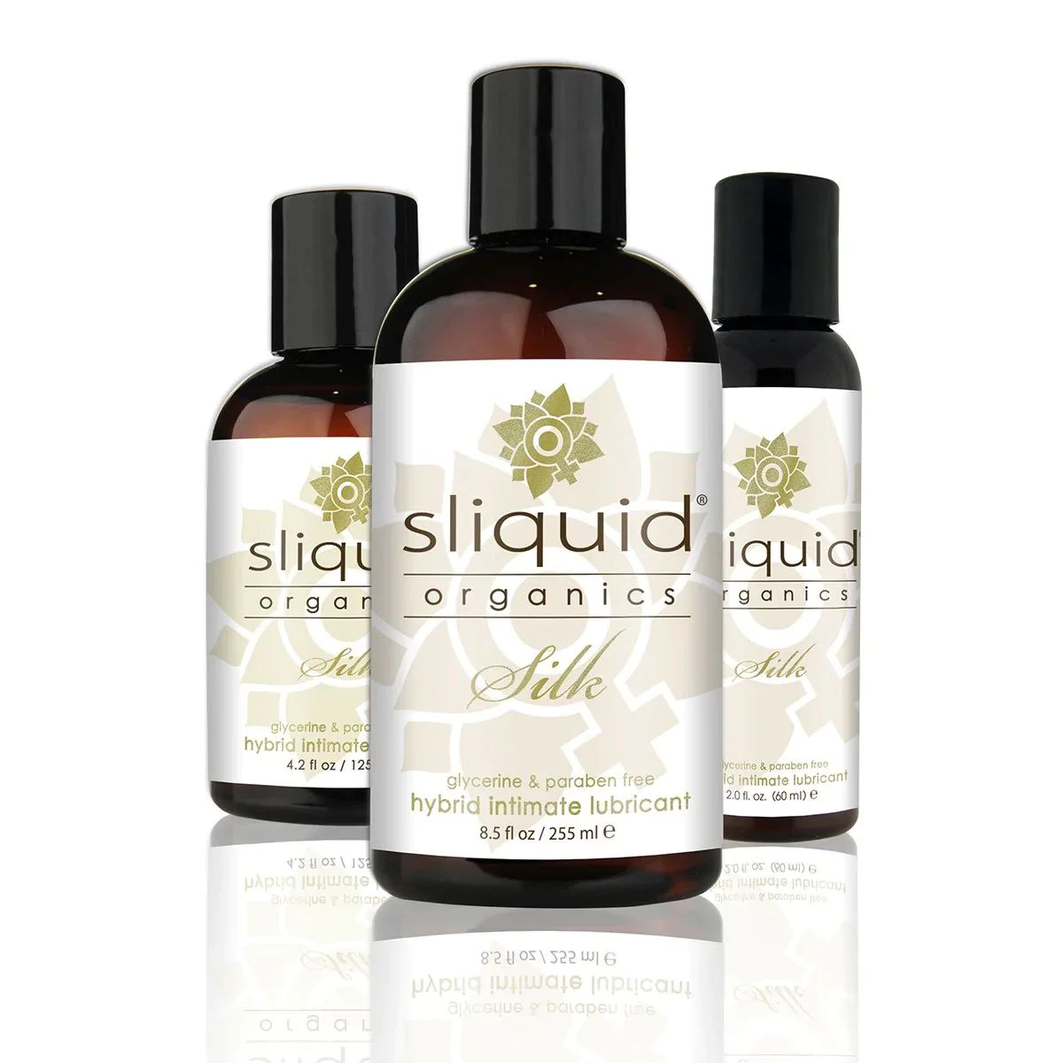 Three bottles of sliquid organics Silk lubricant on a white background