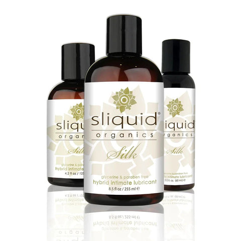 Three bottles of sliquid organics Silk lubricant on a white background