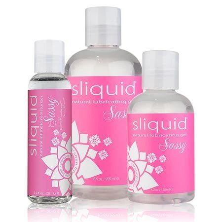 Three bottles of Sliquid Sassy lubricating gel on a white background