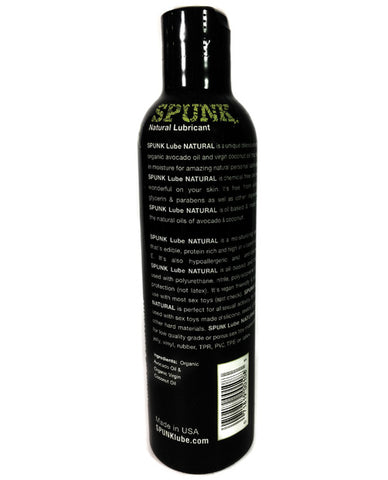 Black bottle of SPUNK Lube Natural lubricant with text on a white background