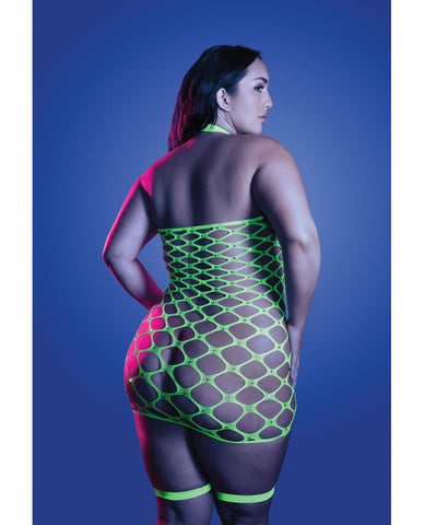 A woman shown from the back wearing a neon green fishnet halter bodysuit with matching thigh bands, posed against a blue studio background.