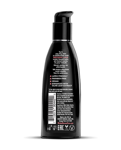 Black bottle with a label on a white background