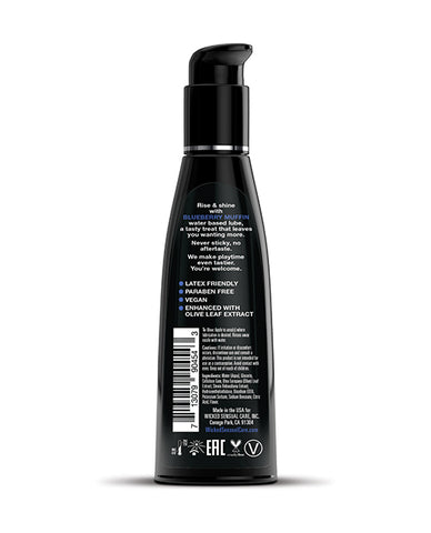 Black bottle with label on a white background